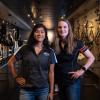 Franchesca C. Ybarra, ’22 (left), and Erin M. Beaver, ’19, maintain and troubleshoot the robotic welding cells responsible for transforming raw steel and aluminum into frames, fenders and fuel tanks at Harley-Davidson’s York vehicle operations plant.