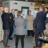 The group gathers around a Haas 5-axis Universal Machining Center in College Avenue Labs, just one example of the corporate philanthropy that helps Penn College create career-ready graduates.