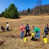 Students plant trees in Rider Park