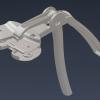 This image represents a knee tensioning device redesigned in Autodesk Inventor by recent Pennsylvania College of Technology graduate Maxine Zglinicki. Zglinicki, of Norristown, worked with Dr. John H. Bailey, a Williamsport-area orthopedic surgeon, on the tool, which is used with a robot for knee replacement surgery. 
