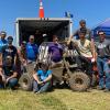 Members of Pennsylvania College of Technology’s Baja SAE team bask in victory after winning the four-hour endurance race at Baja SAE Rochester. Three weeks earlier, Penn College captured the same event at Baja SAE Tennessee Tech. From left are: Dhruv Singh, Dominic J. Lepri, Isaac H. Thollot (crouching), Alex E. Flores, faculty adviser John G. Upcraft, Caleb J. Harvey, Marshall W. Fowler (sitting), Arjun L. Kempe, Morgan R. Bagenstose, Tyler J. Bandle (standing on back of the car), Dakota C. H
