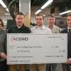 Acero Precision representatives present a $2,000 donation in support of the Penn College student chapter of the Society of Manufacturing Engineers’ entry in the upcoming Baja SAE competition. 