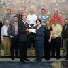 Cleveland Brothers Equipment Co. Inc.'s Randy Fetterolf delivers a Caterpillar contribution to Mary Sullivan, executive director of Penn College's Schneebeli Earth Science Center and assistant dean of transportation and natural resources technologies.