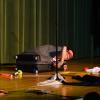 A comedic contortionist packs it in for the night.
