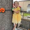 A Butterfly clings to a tree in the CLC courtyard.