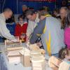 A popular toolbox-construction display requires an assembly-line approach to handle the crowd.