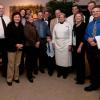 Campus luminaries aiding the cause pause briefly for a group photo. 