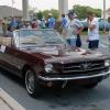 Car enthusiasts line up to view the 1965 Ford Mustang convertible, restored by Penn College students and returned for display at the Antique Automobile Club of America Museum in Hershey.