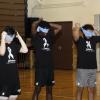 Players affix their blindfolds for an exercise in empathy.