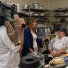 TV reporter and videographer talk with chef