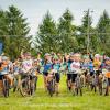 a large group of young cyclists