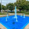 blue fountain on campus