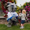 Penn College Wildcat with two children