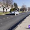 Tucker car traveling down college road