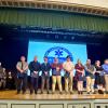 paramedic graduating class of 10 on stage