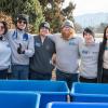 six resident assistants stand ready to move in new students