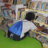 Belize schoolchildren sport Penn College backpacks, delivered along with instructional supplies by a math professor.