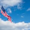 A community landmark, raised as part of the Flags Across America program, flies outside the Student & Administrative Services Center.