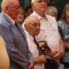 Fred Agnoni, of South Williamsport, a teenage Army officer in the Korean War, holds his hat to his heart during the Reading of the Orders by retired Army Maj. Gen. James Joseph. Agnoni is standing between fellow veterans Richard E. Barkman (left), of Jersey Shore, and Edward E. Adams, of Muncy.