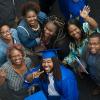 Kadeem D. Carter, collision repair technology graduate, and family revel in the joy of the day. 