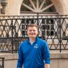 In a rare moment of inactivity, Evan J. Kelbaugh – whose recent internship involved a significant real-world response to disastrous flooding in Bucks County – stands outside Klump Academic Center.