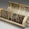 Adele Crawford's “Spinning Lexicon,” dictionary, dowel, found box, 12 inches by 5 inches