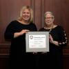 Andrea Reed (left), a 2007 nursing alumna of Penn College who is employed as director of nursing/patient safety, privacy and compliance officer at UPMC Susquehanna Muncy, was presented with a Mentorship Award at the college’s Summer Commencement ceremony by President Davie Jane Gilmour.