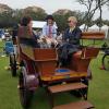 Owner Patricia B. Swigart (left) is among those enjoying a ride with driver Luke C. Miller across the grounds of the illustrious Amelia Island event.