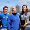 Penn College President Davie Jane Gilmour congratulates the Wildcat Athletes of the Year: Christopher Brennan, soccer, and Kendel Baier, archery.