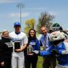 Wildcat "Athletes of the Year" Courtney L. Gernert and Zachary A. Weil are congratulated at Bowman Field by (from left) Penn College President Davie Jane Gilmour, athletic director Scott E. Kennell and a very proud mascot. Gernert is a graphic design major from Palmyra; Weil, of Kutztown, is in the building science and sustainable design: building construction technology concentration. (Photo by Caleb G. Schirmer, student photographer) 