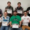 Penn College engineering design students display industry certifications related to Autodesk. From left: Alex P. Fair, Bradford; Rachel E. Heller, Allison Park; David J. Donowski, Tunkhannock; Ian M. Dorman, Mill Hall; Daniel J. Donowski, Tunkhannock; Justin R. Vent, Drexel Hill; and Brian L. Hockenberry, Lewistown. Not pictured: Nicholas E. Leasure, Nazareth;  and Ryan D. Roth, Lebanon.