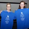 Student leaders Nicole E. Smith (left) and Megan N. Heckman show off the commemorative T-shirts given to each of the evening's graduates.