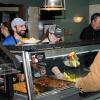 Athletics and Residence Life proved to be able partners for Dining Services. Keeping the parade moving are (from left) Christa Matlack, women's soccer coach; Jamie R. Miller, wrestling coach; Residence Life coordinator Blaise E. Marshall; and baseball coach Chris H. Howard. 