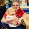 Pennsylvania College of Technology student Mariah N. Marshall, a human services and restorative justice student from Williamsport, celebrates with her daughter during an event at the college’s Dunham Children’s Learning Center. The center received a Child Care Access Means Parents in School grant from the U.S. Department of Education to help reduce fees for students whose children are enrolled at the facility. 