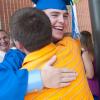 Emergency Medical Services graduate Daniel R. Harrison happily receives his congratulations.