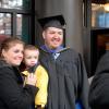 Paul A. McGinn, a business administration: marketing concentration graduate from South Williamsport, celebrates with his family.