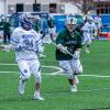 Quinn Caviola (34), shown here during the April 3 season opener against SUNY Morrisville, scored four goals in Sunday's match against La Roche University.