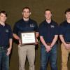 Among the Penn College students on hand to receive “Chapter of the Year” honors from the Pennsylvania Society of Land Surveyors are (from left) Glenn C. Johnson, of Sweet Valley, club president and a scholarship recipient; Jason K. Broadt, of Bloomsburg; secretary; member Jacob G. Stoner, of Scottdale; and Michael A. Mikitish, of Pittston, vice president. Mikitish is a civil engineering technology major; the others are enrolled in surveying technology.