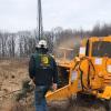 Shreiner, employed at his family's tree care business outside Philadelphia, demonstrates the Bandit chipper at the Earth Science Center campus.