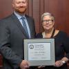 Clinton M. Cullison, a 2004 business administration: marketing concentration graduate, received the Distinguished Alumni Award from Pennsylvania College of Technology President Davie Jane Gilmour. 