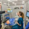 Abigail S. Way, of Montoursville, who is pursuing a bachelor’s degree in dental hygiene: health policy and administration concentration, reviews features of new workstations in Penn College’s renovated Dental Hygiene Clinic with Dr. John Hayes and Dr. Sharon Hayes, who have served as supervising dentists for the clinic.