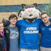 Anthony J. Pace (right), the college's new director of student activities, with student leaders Alexandra M. Lehman and Nicholas V. Walker, and a phenomenal feline VIP. 