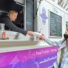 The food vendor, ordinarily parked outside New Trail Brewing Co., feeds another happy customer.