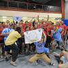 Red-shirted members of the Dauphin Hall team have their attempted group picture invaded by photo-bombing opponents.