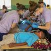 From left, Penn College dental hygiene students Megan M. Mecouch, of Peach Bottom, Lancaster County; Kayla C. Summerson, of Emporium, Cameron County, and Lori M. Weaver, of Newmanstown, Lebanon County, join classmates in cleaning children’s teeth at a school in the Dominican Republic.