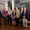 Principals of Amerikohl Mining Inc. and the family of Steelyn G. Kanouff gather near the SASC Donor Wall.