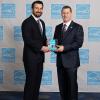 Kenneth P. Hellberg Jr. (left), building performance specialist for Penn College’s National Sustainable Structures Center, accepts the Northwest Energy Efficiency Council Energy Star award from Jonathan Passe, residential branch chief for Energy Star.