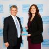 Alison A. Diehl, director of Penn College’s National Sustainable Structures Center, accepts The Northwest Energy Efficiency Council Energy Star award from Jacob Moss, deputy director of the EPA Climate Protection Partnerships Division.