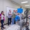 Ian C. Killian (center), a plastics and polymer engineering technology student from South Williamsport, supervises a hands-on exercise for industry professionals during the Extrusion Seminar offered by Penn College’s Plastics Innovation & Resource Center.