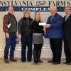 Pennsylvania College of Technology student Paige E. Pearson, of Williamsburg, was among recipients of the 2016 Pennsylvania Farm Show Scholarship. From left are her parents, Lyle and Trisha Pearson; Paige Pearson; Scott Sechler, owner of Bell and Evans; and Pennsylvania Agriculture Secretary Russell Redding.